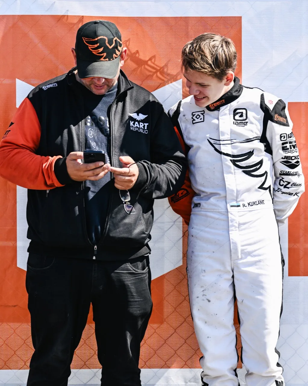 Coach and driver reviewing a completed session