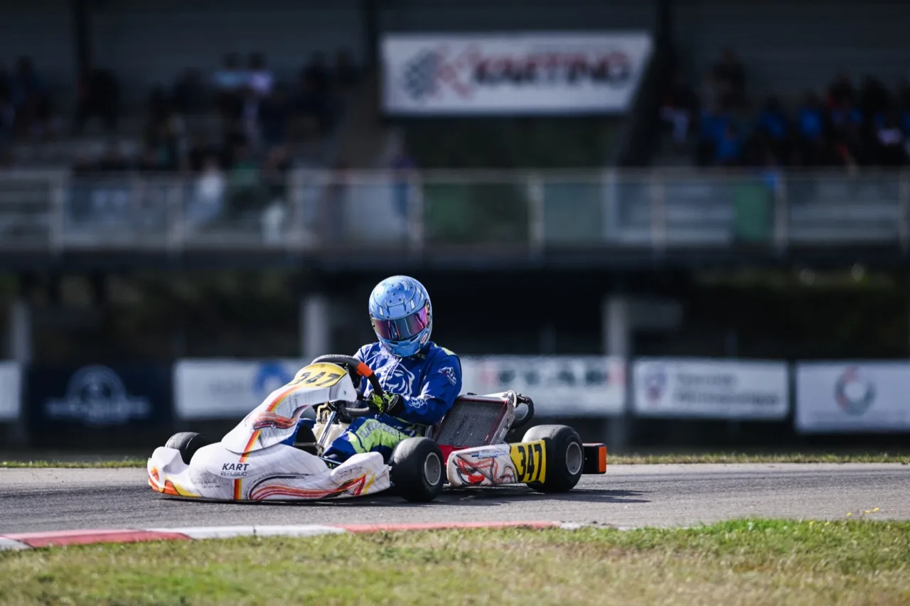 Side view of kart number 347 on circuit