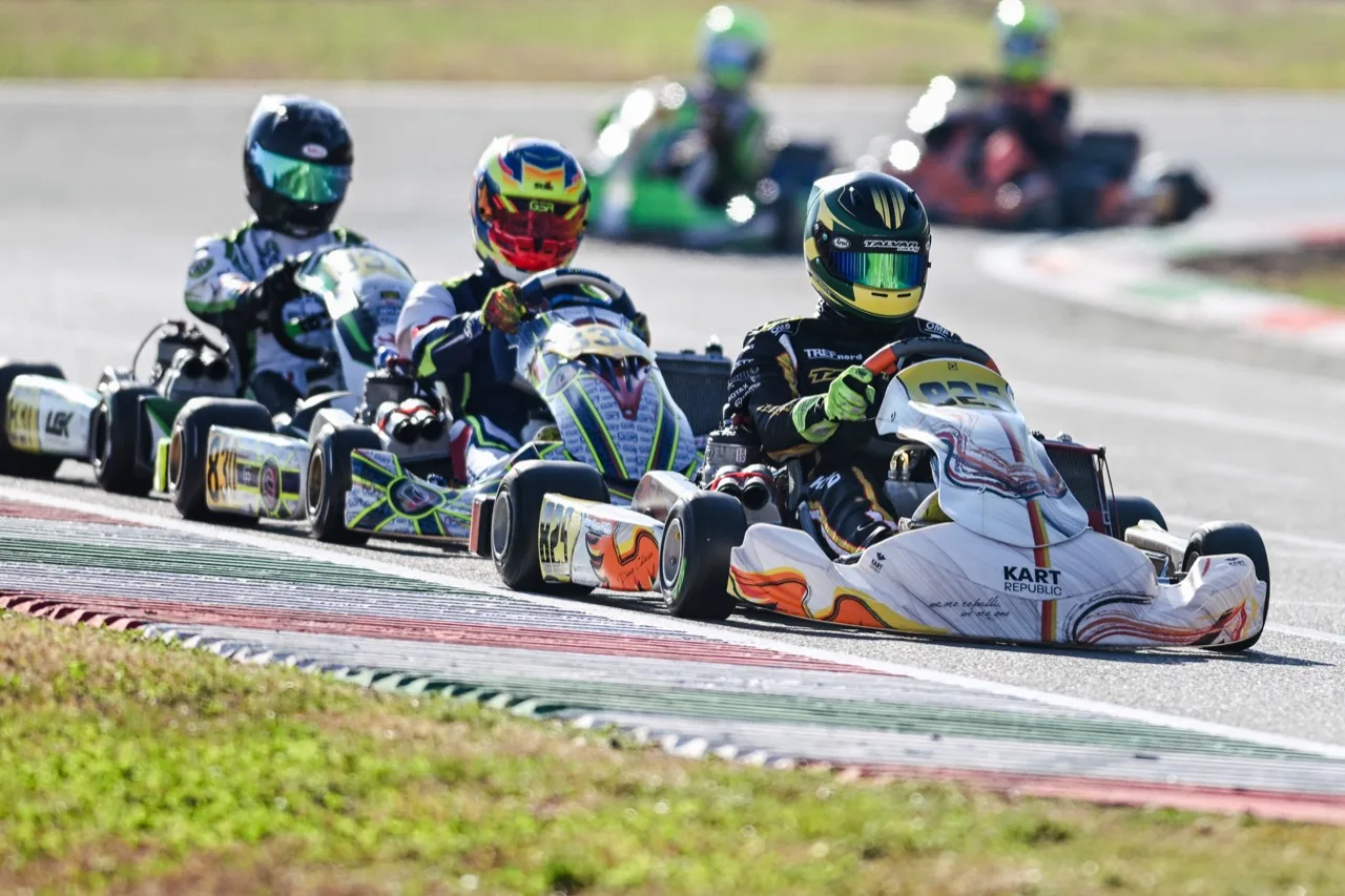 Karting field racing through a corner